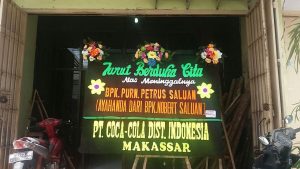 bunga karangan duka cita makassar