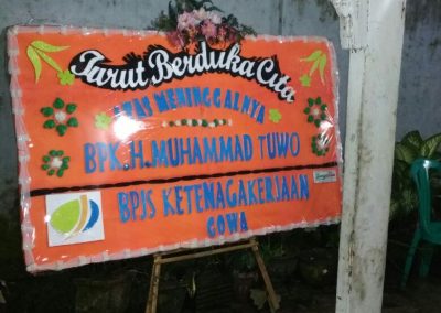 Karangan bunga duka cita makassar